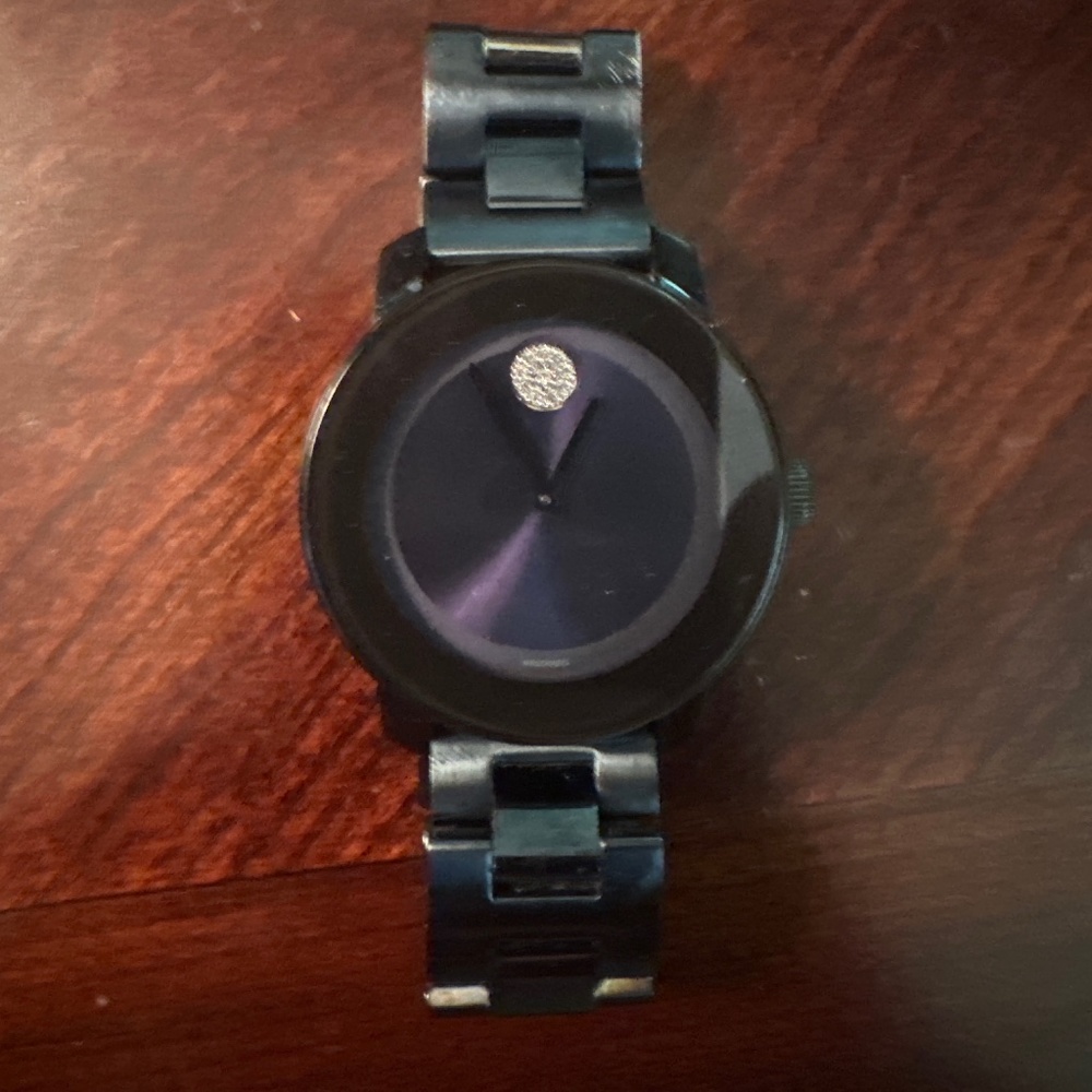 Movado bold ceramic navy blue watch/comes with original box